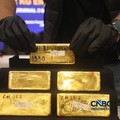 Sejumlah barang bukti diampilkan saat konferensi pers Penindakan Ekspor 22 Kg Emas Batangan di Kantor Pusat Bea Cukai, Jakarta, Selasa (18/8/2026). (CNBC Indonesia/Faisal Rahman)