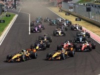 Formula One F1 - Hungarian Grand Prix - Hungaroring, Budapest, Hungary - July 26, 2026 McLaren's Lando Norris leads into the first corner at the start of the race ahead of McLaren's Oscar Piastri REUTERS/Bernadett Szabo     TPX IMAGES OF THE DAY