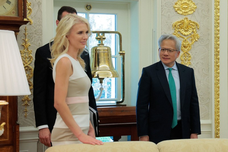 U.S. President Trump walks by his Executive assistant Natalie Harp as they attend a dignified transfer of the remains of U.S. Army service members, Army 1st Lt Tyler James Feehan, Sgt. Angel S. Rampersad, Pvt. Isabella Gonzales, killed during an attack on Muwaffaq Salti Air Base in Jordan, and Sgt. Michael Emmanuel Swinton, killed in action during a controlled detonation of a downed one-way unmanned aerial system at Erbil Air Base in Iraq, at Dover Air Force Base in Dover, Delaware, U.S., July 22, 2026. REUTERS/Evan Vucci