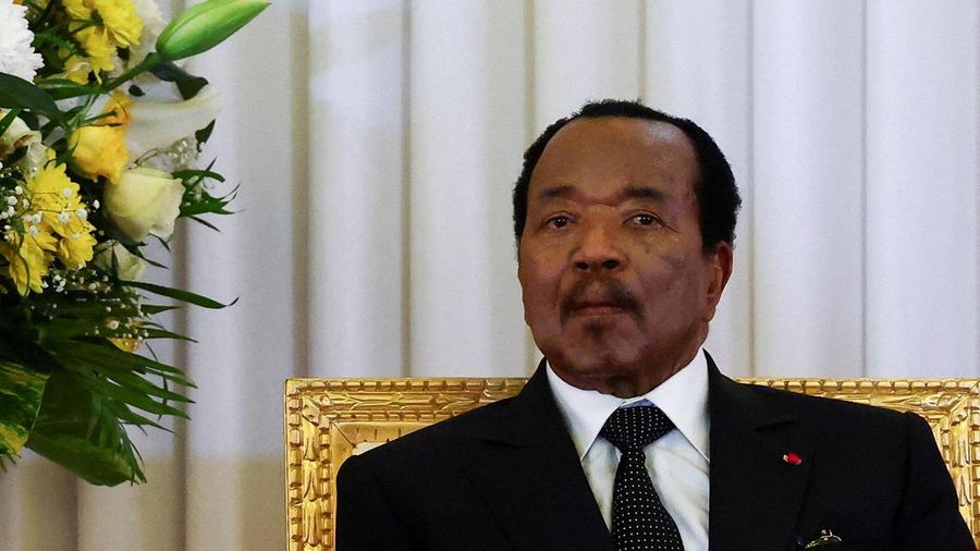 FILE PHOTO: FILE PHOTO: Cameroonian President Paul Biya listens as Pope Leo XIV (not pictured) delivers a speech, at the Presidential Palace in Yaounde, during his apostolic journey to Cameroon, April 15, 2026. REUTERS/Guglielmo Mangiapane/File Photo