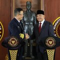 Indonesia's Defence Minister Sjafrie Sjamsoeddin looks on as he shakes hands with Chinese Defence Minister Dong Jun following their meeting in Jakarta, Indonesia, August 21, 2026. REUTERS/Ajeng Dinar Ulfiana