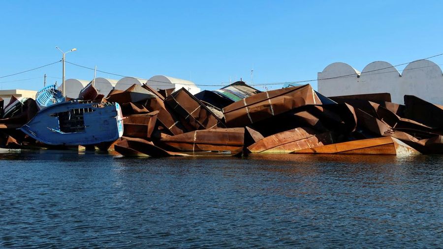 FILE PHOTO: A view shows boats that were used by migrants and seized by Tunisian coastguards, in Sfax, Tunisia April 26, 2023. REUTERS/Jihed Abidellaoui/File Photo
