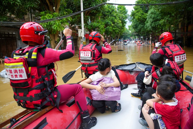 Floodwaters inundate a street lined with residential buildings after heavy rainfall brought by typhoon Narra caused flooding in Ningming county, Chongzuo, Guangxi Zhuang Autonomous Region, China August 24, 2026. cnsphoto via REUTERS   ATTENTION EDITORS - THIS IMAGE WAS PROVIDED BY A THIRD PARTY. CHINA OUT. NO COMMERCIAL OR EDITORIAL SALES IN CHINA