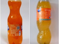 Foto gabungan memperlihatkan botol Fanta ukuran 750 ml di sebuah kantor di Mumbai, India, pada 24 Agustus 2026, dan botol Fanta ukuran 500 ml di sebuah kantor di London, Inggris, pada 24 Agustus 2026. (REUTERS/Francis Mascarenhas and Hiba Kola/Illust