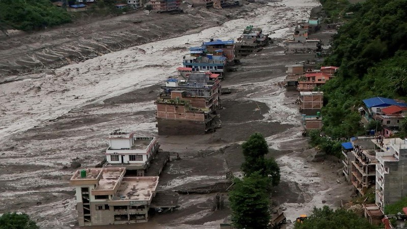 Pemandangan dari udara yang memperlihatkan bangunan-bangunan tertutup lumpur setelah banjir bandang di Trishuli, Distrik Nuwakot, Nepal, pada 26 Agustus 2026.