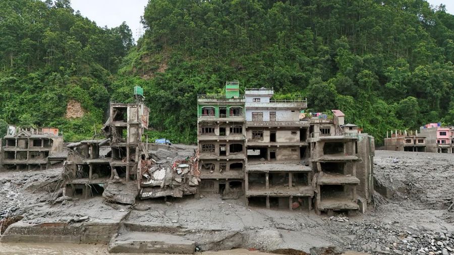 Tampilan dari drone memperlihatkan lumpur yang menutupi bangunan setelah banjir bandang di Trishuli, distrik Nuwakot, Nepal, pada 27 Agustus 2026. Tampilan dari drone memperlihatkan lumpur yang menutupi bangunan setelah banjir bandang di Trishuli, distrik Nuwakot, Nepal, pada 27 Agustus 2026.