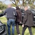 Polisi Australia memborgol terduga otak di balik TeamPCP. (Tangkapan Layar Video/Australian Federal Police)
