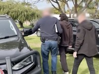 Polisi Australia memborgol terduga otak di balik TeamPCP. (Tangkapan Layar Video/Australian Federal Police)