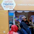 Lembaga Penjamin Simpanan atau LPS ramaikan kegiatan Bazar UMKM melalui booth edukasi bagi pelaku UMKM dan masyarakat di Bandar Lampung, Sabtu (29/8/2026).. (CNBC Indonesia/Muhammad Sabki)