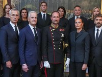 Norway's King Haakon and Crown Princess Ingrid Alexandra pose with Prime Minister Jonas Gahr Stoere and cabinet ministers during an extraordinary cabinet meeting at the Royal Palace, following the death of King Harald, in Oslo, Norway, August 28, 202