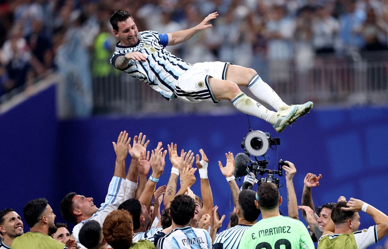 FILE PHOTO: Soccer Football - FIFA World Cup 2026 - Round of 16 - Argentina v Egypt - Atlanta Stadium, Atlanta, Georgia, U.S. - July 7, 2026 Argentina's Lionel Messi is thrown in the air in celebration by teammates after the match as Argentina qualify for the quarter finals of the World Cup IMAGN IMAGES via Reuters/Brett Davis/File Photo