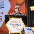 Wakil Ketua Dewan Komisioner LPS, Farid Azhar Nasution saat menyampaikan pemaparan dalam Lampung Financial Festival di Hotel Novotel, Bandar Lampung, Sabtu (5/9/2026). (CNBC Indonesia/Tri Susilo)