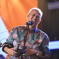 Ketua Dewan Komisioner LPS Anggito Abimanyu bermain alat musik Flute di Lembaga Financial Festival (LPS) di Lampung, Minggu (6/9/2026). (CNBC Indonesia/Tri Susilo)