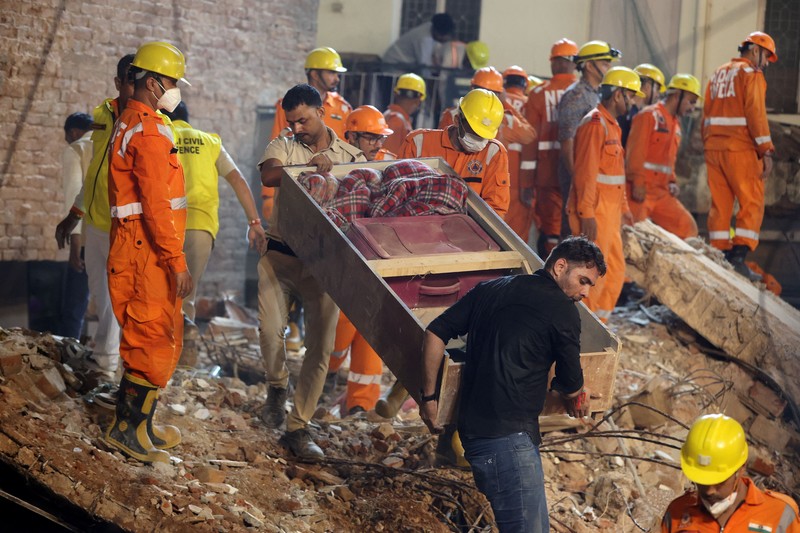 National Disaster Response Force (NDRF) personnel work at the scene after a building collapsed, in New Delhi, India, September 6, 2026. REUTERS/Francis Mascarenhas     TPX IMAGES OF THE DAY