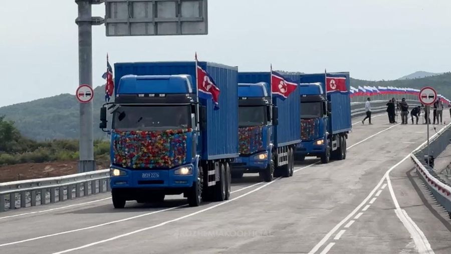 NORTHKOREA-RUSSIA/BRIDGE Trucks drive along a road during a ceremony opening the first road bridge between Russia and North Korea across the Tumen River, locally known as Tumannaya, on the border with North Korea in the Primorsky region, Russia, September 7, 2026, in this st