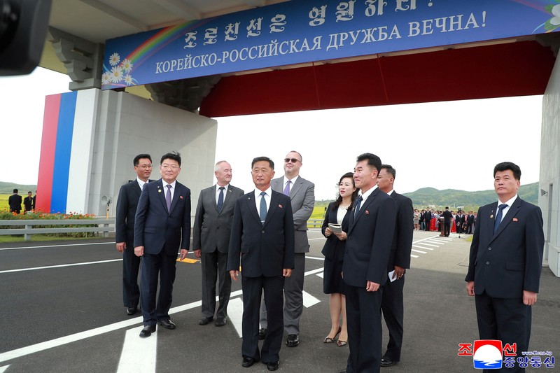Attendees applaud as North Korea and Russia open their first road bridge, a structure that spans the Tumen river connecting the border cities of Rason and Khasan,  in this picture released by North Korea's official Korean Central News Agency, September 7, 2026.   KCNA via REUTERS    ATTENTION EDITORS - THIS IMAGE WAS PROVIDED BY A THIRD PARTY. REUTERS IS UNABLE TO INDEPENDENTLY VERIFY THIS IMAGE. NO THIRD PARTY SALES. SOUTH KOREA OUT. NO COMMERCIAL OR EDITORIAL SALES IN SOUTH KOREA.