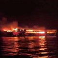 MV June Aster terbakar dengan kobaran api dan kepulan asap yang membubung setelah kebakaran melanda kapal feri tersebut di lepas pantai Palawan, Filipina; gambar ini merupakan tangkapan layar dari video yang dirilis pada 9 September 2026. (Philippine
