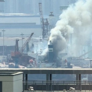 Smoke rises from a cargo ship in a Chinese port, after it was reported to have caught fire during repairs, in Qingdao, Shandong province, China, September 10, 2026 in this screen grab obtained from a social media video. Social Media/via REUTERS  THIS