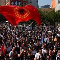 Supporters of former Kosovo President Hashim Thaci gather on the day Thaci and other former Kosovo Liberation Army (KLA) members hear the judgment in their war crimes trial at the Kosovo Specialist Chambers in The Hague, in Pristina, Kosovo September