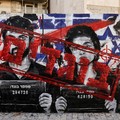 Graffiti depicting Yuval Abraham and Rachel Szor, the directors of the documentary film NAZA, and the word "traitors" in Hebrew, on a wall in Ashdod, southern Israel, September 15, 2026. NAZA was awarded the Special Jury Prize at the Venice Film Fest