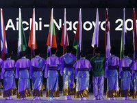 Pemandangan umum bendera negara-negara peserta berkibar dalam upacara pembukaan Asian Games Aichi-Nagoya 2026, di Stadion Paloma Mizuho, Nagoya, Jepang, (19/9/2026). (REUTERS/Eloisa Lopez))