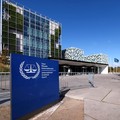 FILE PHOTO: People stand outside the International Criminal Court in the Hague, Netherlands, September 22, 2025. REUTERS/Piroschka van de Wouw/File Photo/File Photo