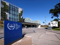 FILE PHOTO: People stand outside the International Criminal Court in the Hague, Netherlands, September 22, 2025. REUTERS/Piroschka van de Wouw/File Photo/File Photo