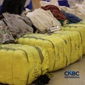 Sejumlah barang bukti ditampilkan dalam Konferensi Pers Penindakan Impor Ilegal Beras, Garam, dan Balpres di Kantor Pusat Bea Cukai, Jakarta, Selasa (22/9/2026). (CNBC Indonesia/Tri Susilo)