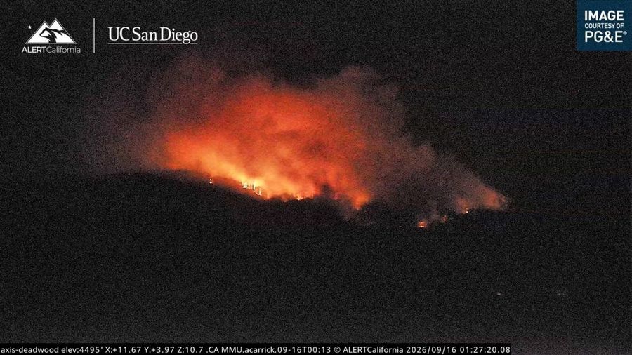 Flames from the Dome Fire, a wildfire burning in Yosemite National Park, illuminating the night in California, US, September 16, 2026, in this still image taken from video.   ALERTCalifornia | UC San Diego/Handout via REUTERS    THIS IMAGE HAS BEEN S