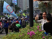 Masa dari kalangan buruh mulai membubarkan diri di depan Gedung Plaza UOB, Jalan M.H Thamrin, Kamis, (24/9/2026).(CNBC Indonesia/Muhammad Sabki)