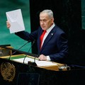 Israel's Prime Minister Benjamin Netanyahu holds a Starlink device as he addresses the 81st United Nations General Assembly (UNGA) at UN headquarters in New York City, US, September 24, 2026.  REUTERS/EDUARDO MUNOZ