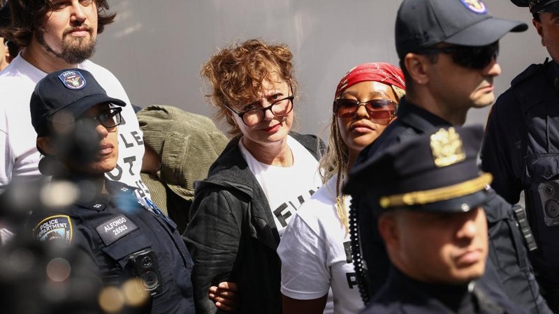 New York City Police Department (NYPD) officers detain US actress Susan Sarandon and pro-Palestinian demonstrators who were blocking First Avenue near the United Nations headquarters building, ahead of Israel's Prime Minister Benjamin Netanyahu's add