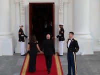Amazon founder Jeff Bezos and his wife Lauren Sanchez arrive for a state dinner hosted by President Donald Trump and first lady Melania Trump for Chinese President Xi Jinping and his wife, Peng Liyuan, at the North Portico of the White House in Washi