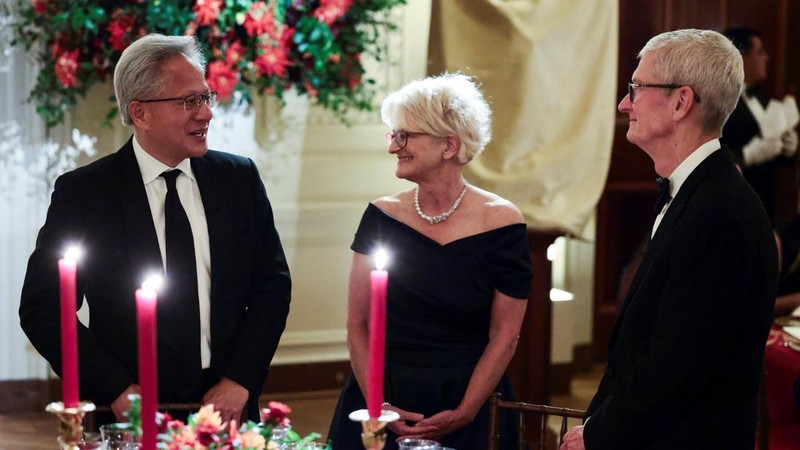 Nvidia CEO Jensen Huang and his wife Lori Huang and Tim Cook, chairman of the board of directors of Apple, attend a state dinner hosted by US President Donald Trump and first lady Melania Trump for Chinese President Xi Jinping and his wife, Peng Liyu