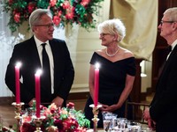 Nvidia CEO Jensen Huang and his wife Lori Huang and Tim Cook, chairman of the board of directors of Apple, attend a state dinner hosted by US President Donald Trump and first lady Melania Trump for Chinese President Xi Jinping and his wife, Peng Liyu