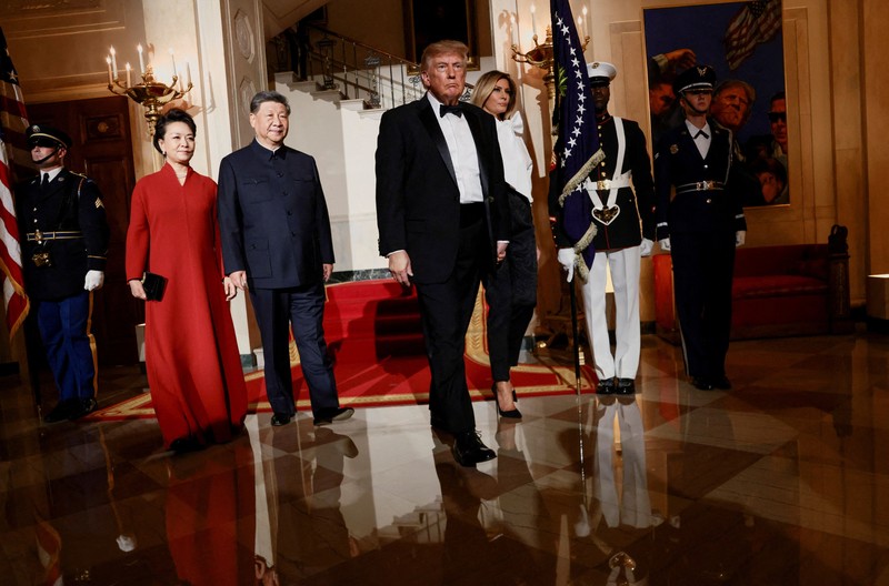 US President Donald Trump and first lady Melania Trump prepare to welcome Chinese President Xi Jinping and his wife, Peng Liyuan, at the North Portico of the White House for a state dinner in Washington, D.C., US, September 24, 2026. REUTERS/Kylie Cooper