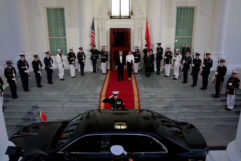 US President Donald Trump and first lady Melania Trump prepare to welcome Chinese President Xi Jinping and his wife, Peng Liyuan, at the North Portico of the White House for a state dinner in Washington, D.C., US, September 24, 2026. REUTERS/Kylie Cooper