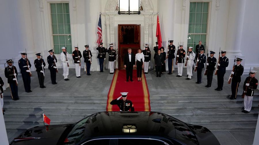 US President Donald Trump and first lady Melania Trump prepare to welcome Chinese President Xi Jinping and his wife, Peng Liyuan, at the North Portico of the White House for a state dinner in Washington, D.C., US, September 24, 2026. REUTERS/Kylie Co