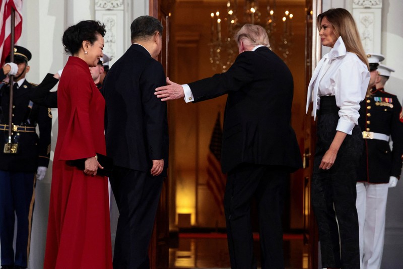 US President Donald Trump and first lady Melania Trump prepare to welcome Chinese President Xi Jinping and his wife, Peng Liyuan, at the North Portico of the White House for a state dinner in Washington, D.C., US, September 24, 2026. REUTERS/Kylie Cooper