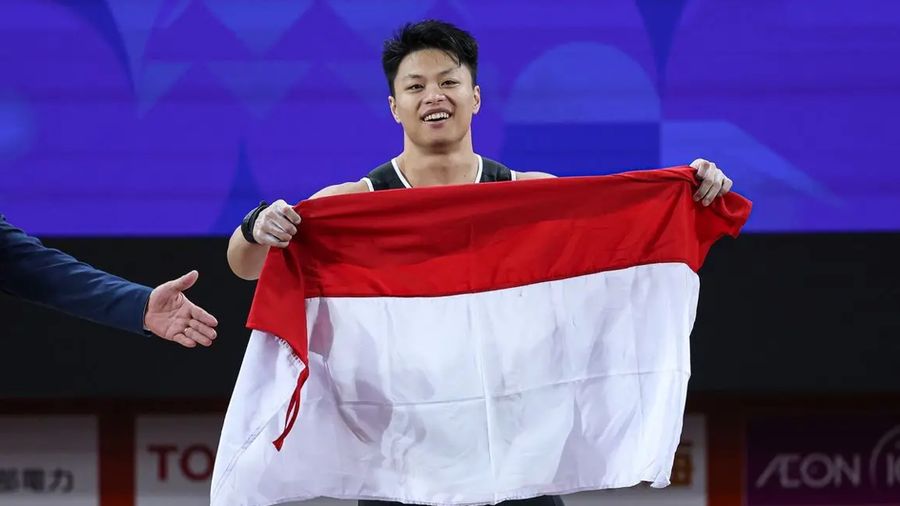 Atlet Angkat Besi Indonesia, Rahmat Erwin Abdullah Raih Emas di ASIAN Games 2026. (Dok NOC Indonesia)