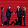 US President Donald Trump and Chinese President Xi Jinping shake hands alongside US first lady Melania Trump and Chinese President Xi Jinping's wife Peng Liyuan, after visiting the National Archives Museum in Washington, D.C., US, September 25, 2026.