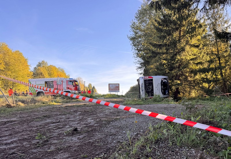An overturned tour bus lies on the motorway A96 after a crash, killing two people and injuring several others, near Landsberg am Lech, Germany, September 27, 2026. REUTERS/Christine Uyanik     TPX IMAGES OF THE DAY