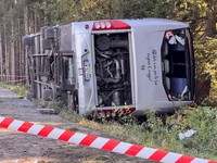 An overturned tour bus lies on the motorway A96 after a crash, killing two people and injuring several others, near Landsberg am Lech, Germany, September 27, 2026. REUTERS/Christine Uyanik     TPX IMAGES OF THE DAY