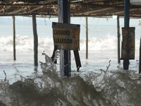 High tides caused by Hurricane Polo floods a beachfront restaurant in San Blas, Nayarit, Mexico, September 26, 2026. REUTERS/Christian Ruano