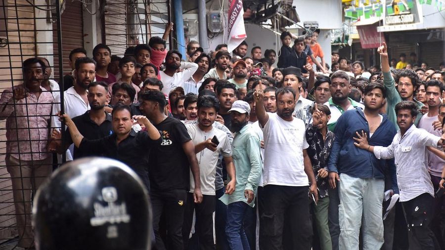 Protesters gesture towards police officers during a demonstration over the Shahi Masjid dispute inUjjain, Madhya Pradesh, India, September 28, 2026. REUTERS/Stringer