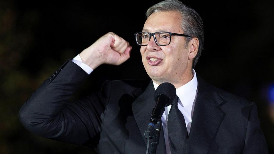 Serbian President Aleksandar Vucic gestures to citizens outside the Presidency of Serbia moments before formally submitting his resignation, ending his second and final five-year term in office, in Belgrade, Serbia, September 27, 2026. REUTERS/Djordj