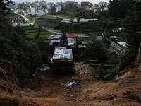 A toppled house after it was swept by a landslide, following incessant rains, in Lalitpur, Nepal, September 28, 2026. REUTERS/Navesh Chitrakar