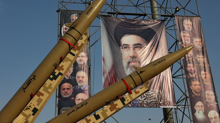Iranian missiles are displayed next to a banner with a picture of Iran's Supreme Leader Mojtaba Khamenei, on a street in Tehran, Iran, September 27, 2026. Majid Asgaripour/WANA (West Asia News Agency) via REUTERS ATTENTION EDITORS - THIS PICTURE WAS