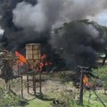 Smoke rises as fire burns following a Myanmar military airstrike, according to a rebel group that controls the area and a local aid worker, in Kyauktaw, Rakhine State, Myanmar, in this screen grab obtained from a social media video released September