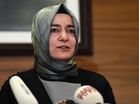(FILES) Turkey's Family Minister Fatma Betul Sayan Kaya speaks to media after arriving at the Ataturk International airport on March 12, 2017 in Istanbul. A former minister and senior member of Turkish President Recep Tayyip Erdogan's ruling AKP part